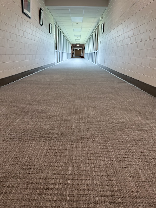 A Spartanburg Day School hallway with new carpet tiles recently installed.